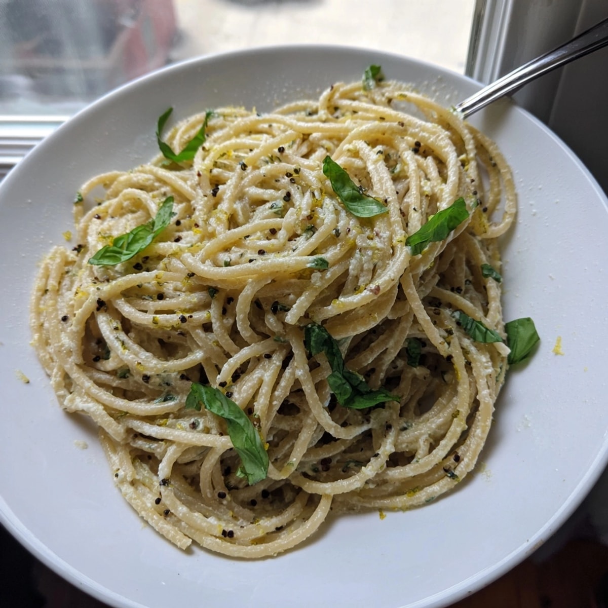 Enjoy swirls of Lemon Basil Ricotta Pasta, a quick and easy Italian vegetarian meal.
