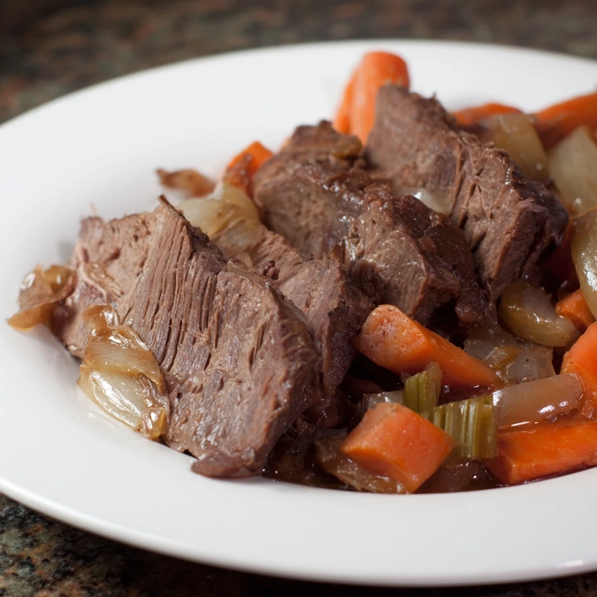 A close-up of tender, juicy beef brisket, a classic American comfort food meal.