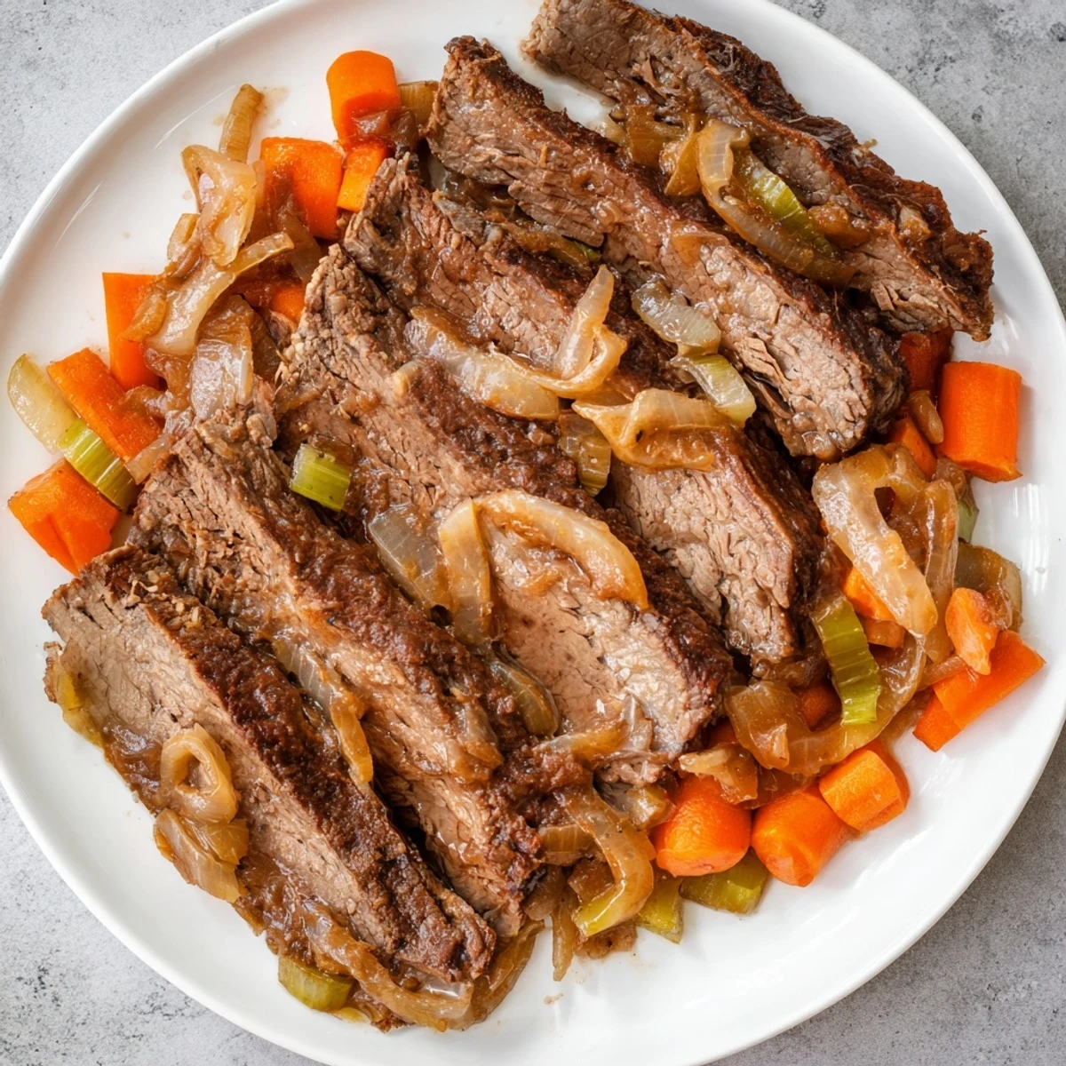 Melt-in-your-mouth beef brisket in a rich sauce, ready to serve and enjoy with family.