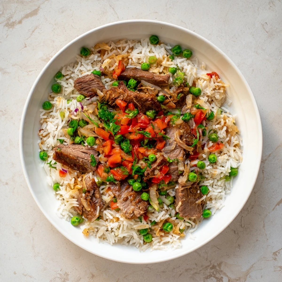 Steaming Beef and Rice Skillet with tender beef and fluffy rice, ready to eat.