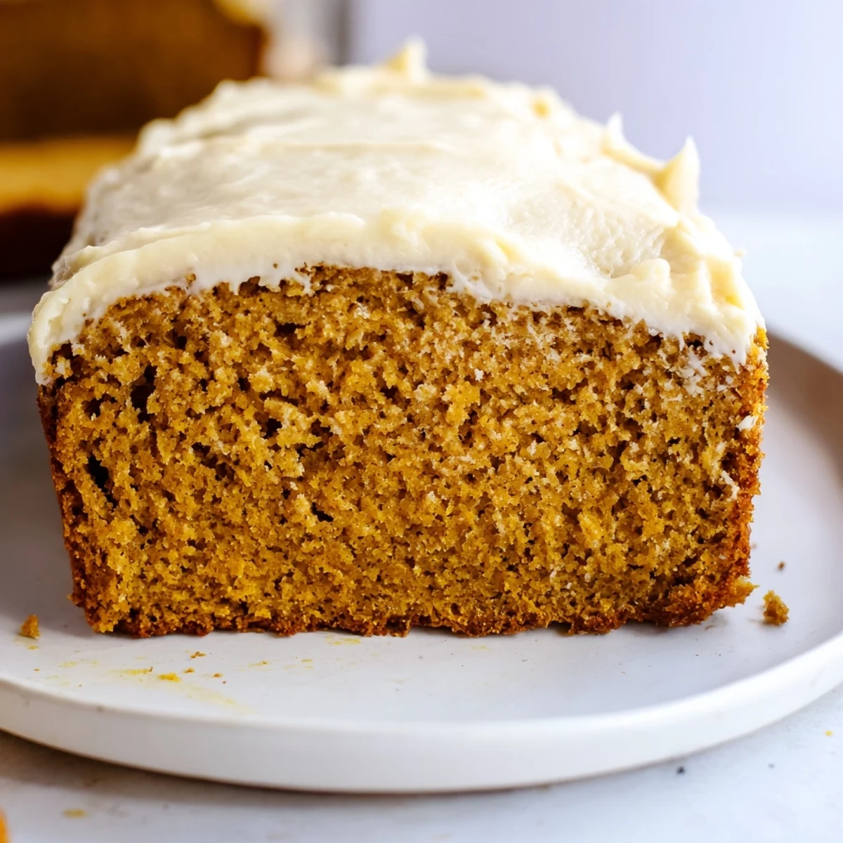Homemade frosting gingerbread, a delicious dessert with creamy vanilla frosting and warm spices to enjoy.