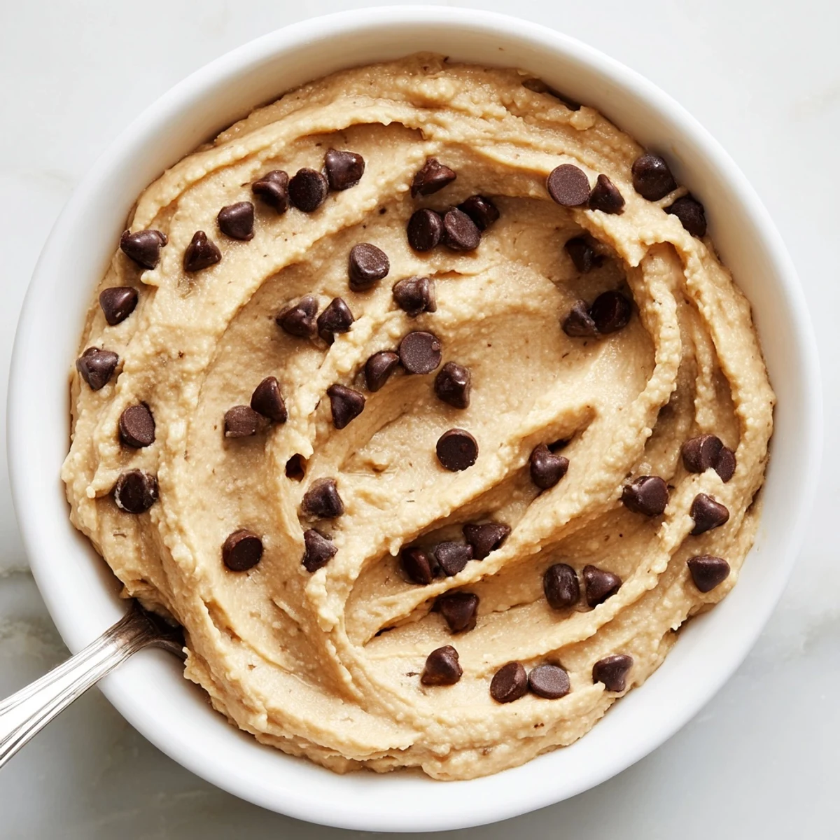 Ready-to-eat Chocolate Chip Cookie Dough Hummus, a healthy and delightful dessert or snack option.