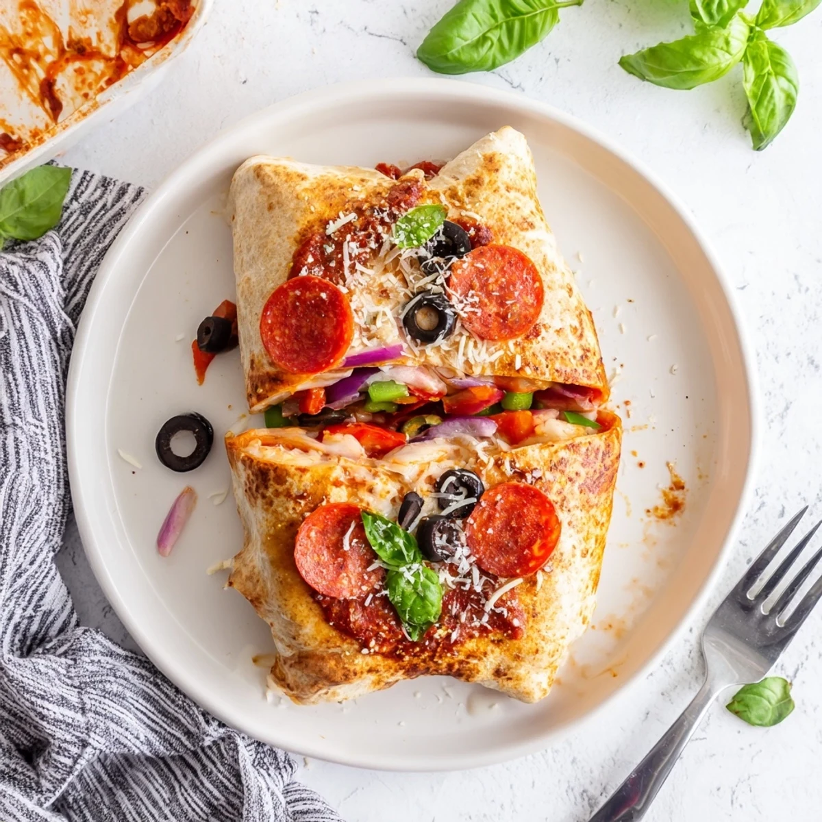 Slice of stuffed pizza burrito revealing layers of pepperoni peppers and gooey cheese