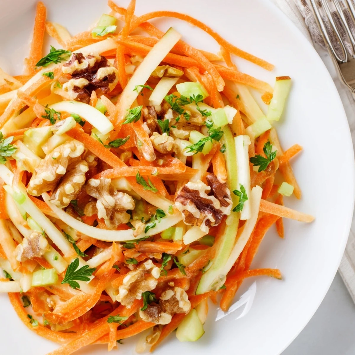 Crunchy Apple Carrot Salad With Creamy Citrus Dressing served chilled for light lunch
