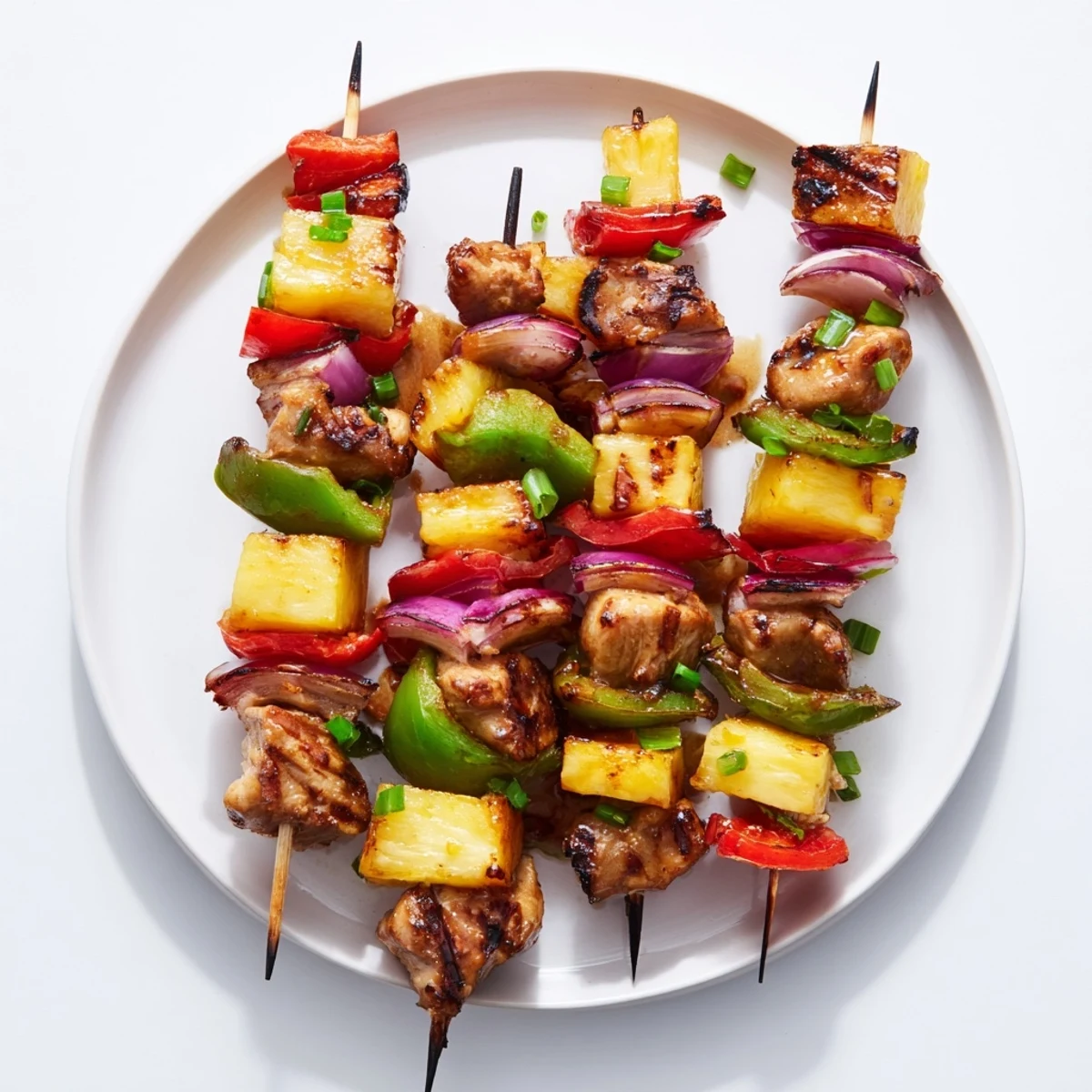 Smoky-sweet Hawaiian Turn Turn Chicken Kebabs brushed with glaze, fragrant ginger aroma