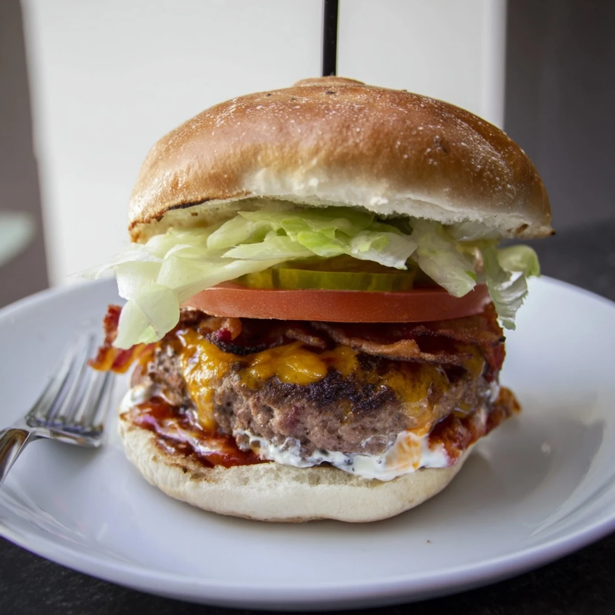 Irresistible Crack Burgers topped with melty cheddar, crispy bacon, and toasted buns