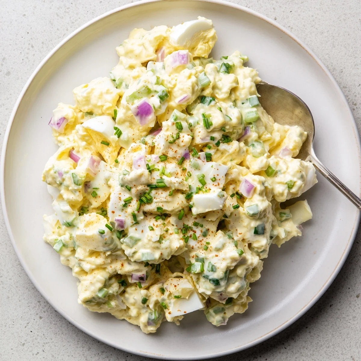 Chilled Classic Egg Salad Recipe with crunchy celery and tangy Dijon mustard.