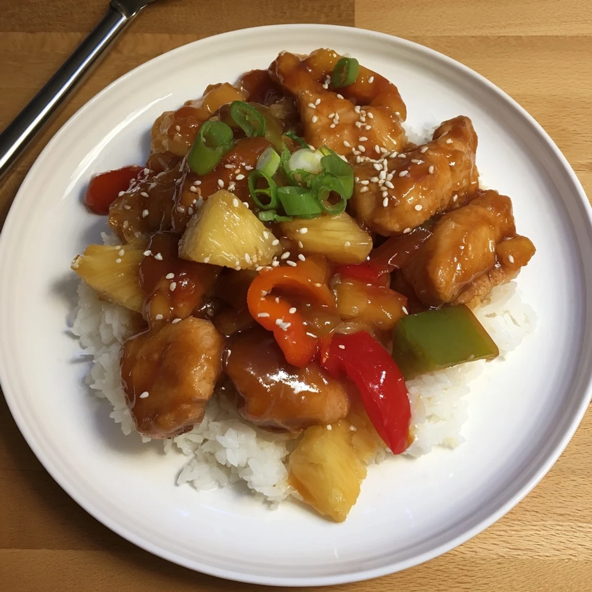 Tender, slow-cooked Sweet Hawaiian Crockpot Chicken releasing tangy pineapple aroma and juices