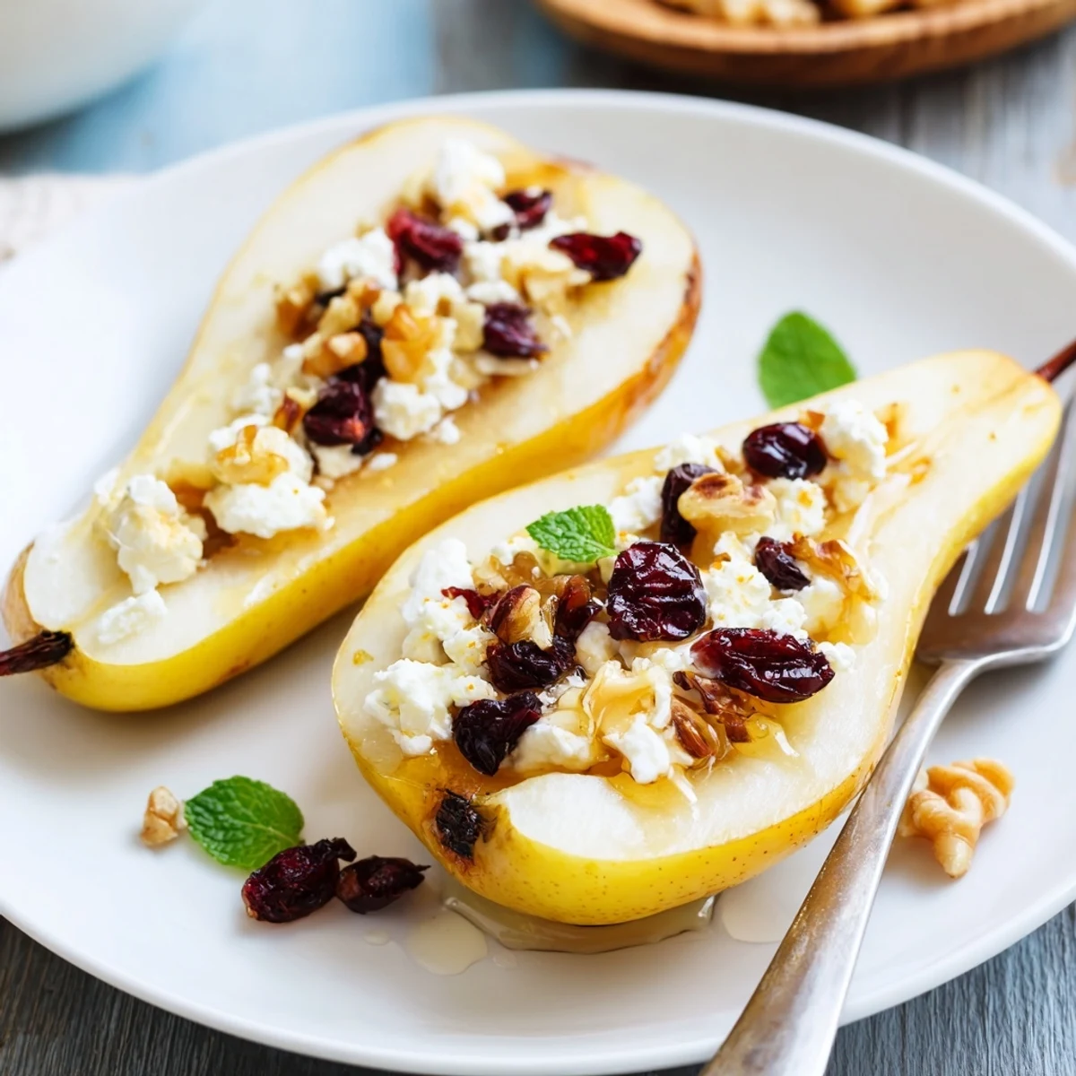 Serve Baked Pears With Feta Honey Cranberries warm with tangy Greek yogurt.