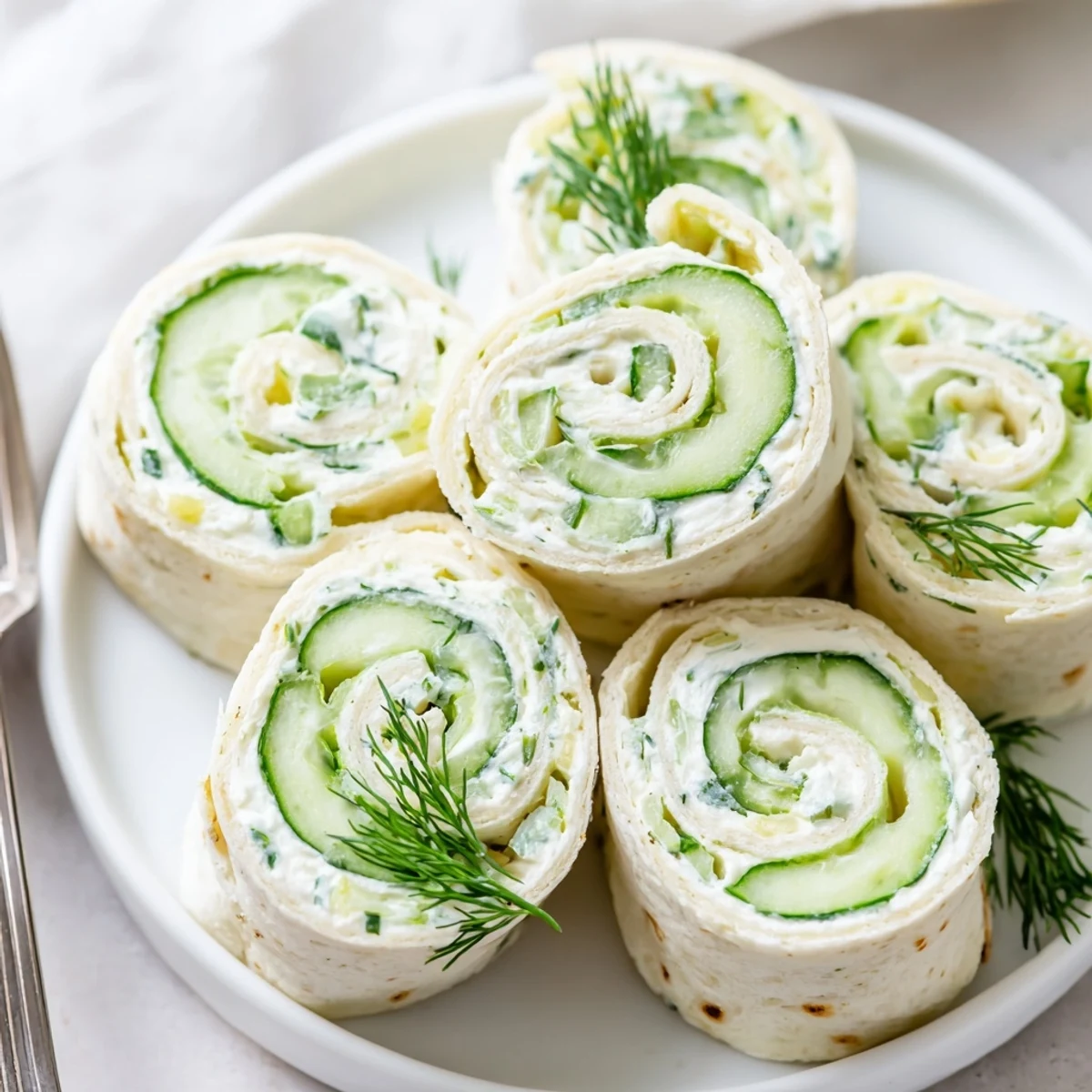 Bright Cucumber And Dill Pinwheels sliced thin, crisp bites, lemony tang