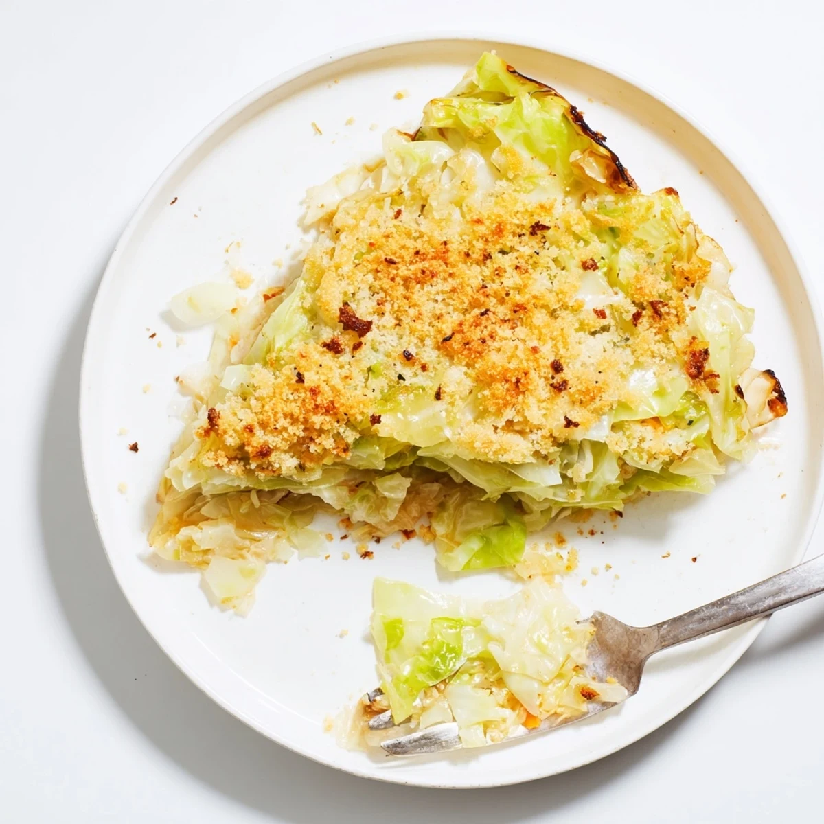 Slow Roasted Cabbage And Sauerkraut Casserole layered, tender cabbage and tangy sauerkraut filling.