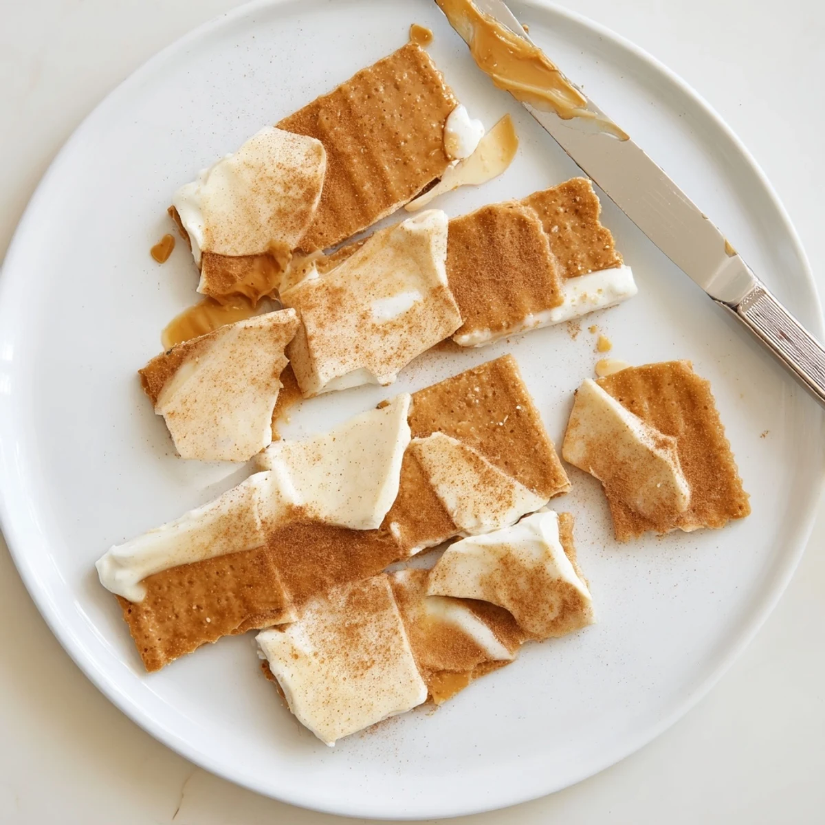 Creamy white chocolate melts over buttery toffee in this Churro Saltine White Toffee