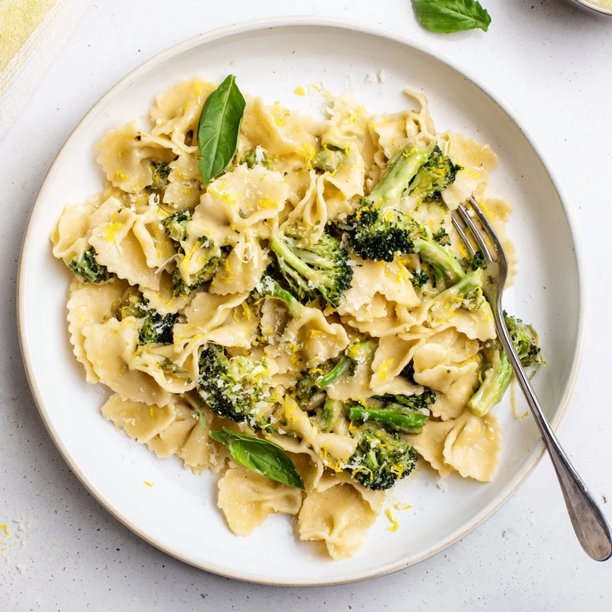 Creamy Mafaldine Pasta Limone Broccoli tossed in a bright lemon Parmesan sauce