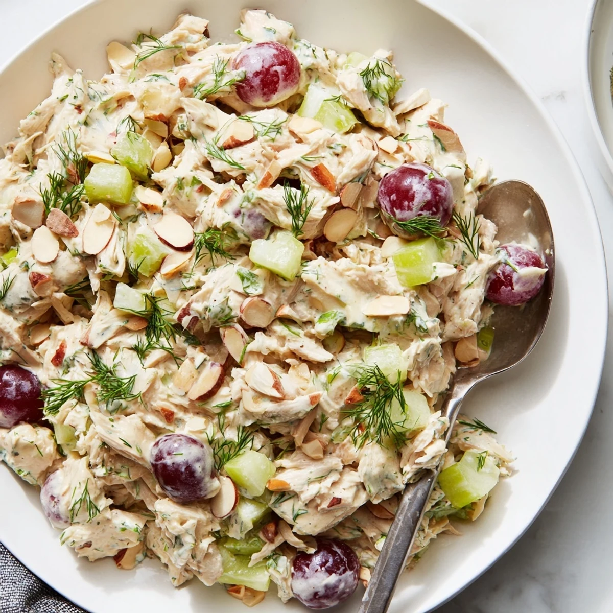 Hearty vegan chicken salad wrapped in a flour tortilla with crunchy celery bits