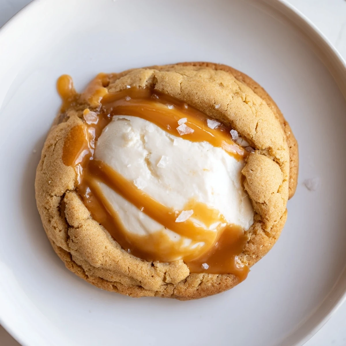 Creamy caramel cheesecake cookies freshly baked with luscious cheesecake filling and gooey topping