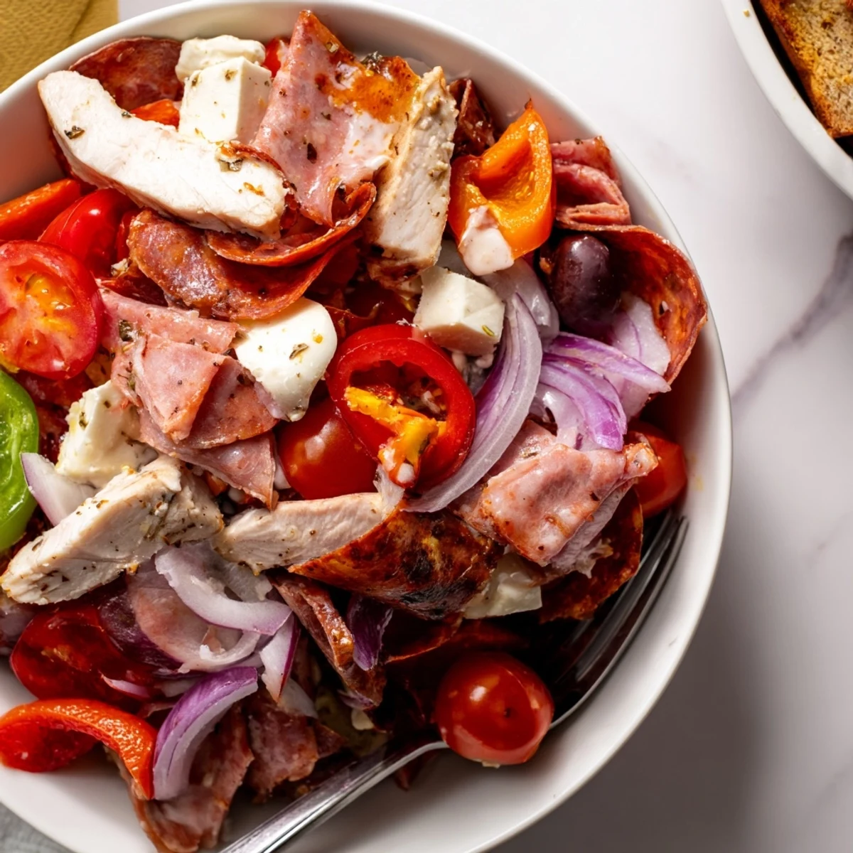 Hearty Italian grinder chicken salad loaded with sliced deli meats and provolone cheese. Fresh Italian grinder chicken salad topped with grilled chicken strips and zesty dressing. Colorful Italian grinder chicken salad featuring crisp romaine lettuce, bright tomatoes, and pepperoncini.