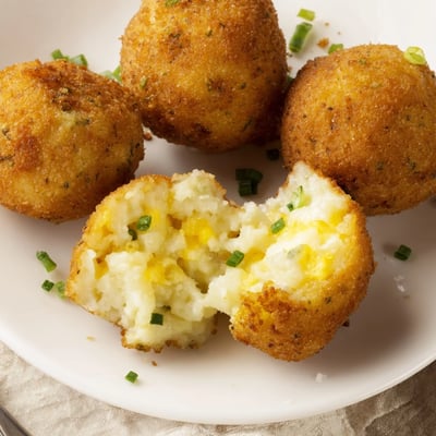 Warm Fried Mashed Potato Balls, creamy inside and crunchy outside, party-perfect