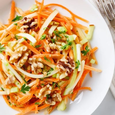 Crunchy Apple Carrot Salad With Creamy Citrus Dressing served chilled for light lunch