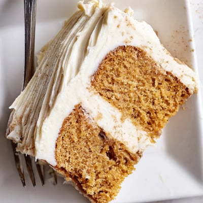 Moist brown butter banana cake topped with generous swirls of sweet cream cheese frosting